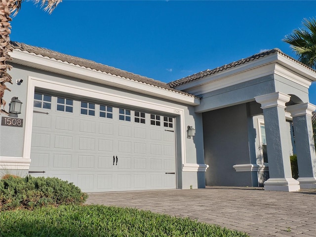 1508BUNKERDRIVE Bunker, Davenport, FL 33896 - garage with decorative driveway