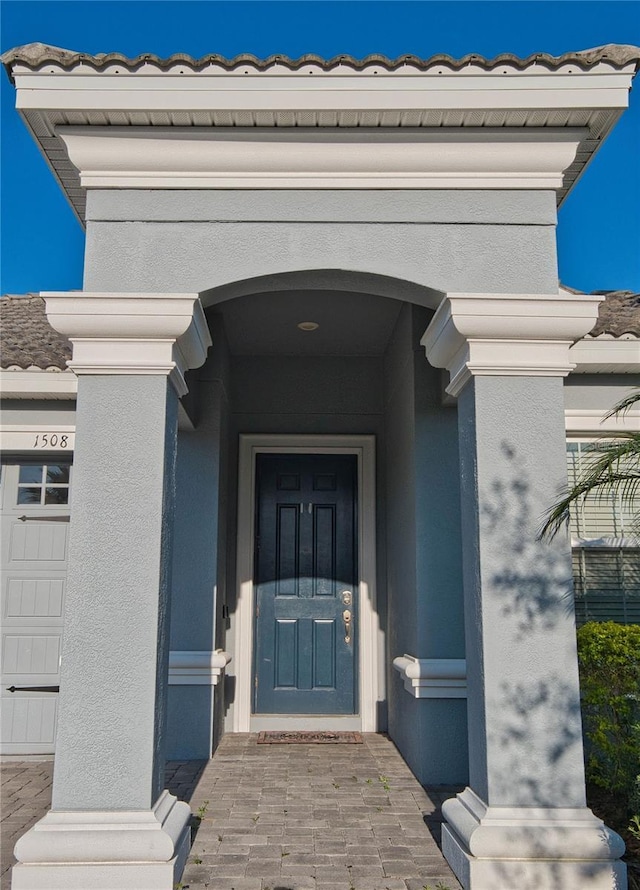 1508BUNKERDRIVE Bunker, Davenport, FL 33896 - entrance to property featuring stucco siding
