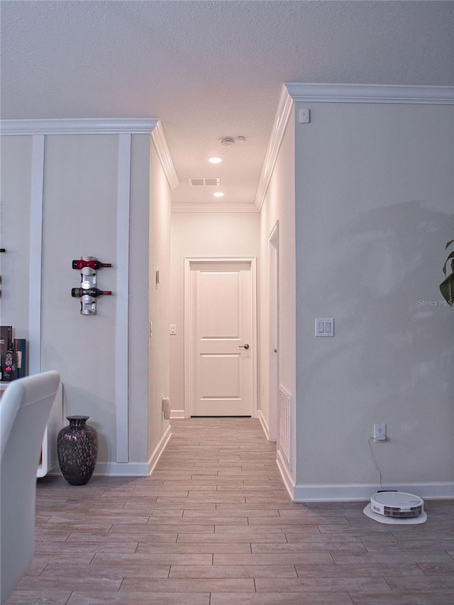 1508BUNKERDRIVE Bunker, Davenport, FL 33896 - hall with ornamental molding, wood finished floors, and baseboards