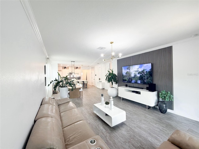 1508BUNKERDRIVE Bunker, Davenport, FL 33896 - living area with a chandelier, crown molding, wood finished floors, and baseboards