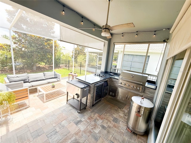 1508BUNKERDRIVE Bunker, Davenport, FL 33896 - sunroom / solarium featuring exterior kitchen, rail lighting, outdoor lounge area, and a ceiling fan