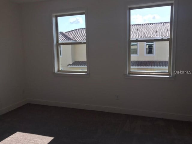 13885 Arclid St, Orlando, FL 32832 - spare room with baseboards