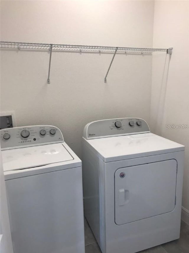 13885 Arclid St, Orlando, FL 32832 - washroom with washing machine and dryer