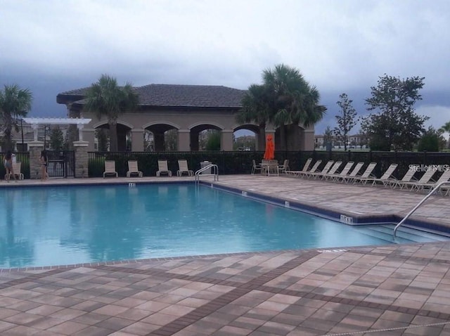 13885 Arclid St, Orlando, FL 32832 - community pool with a patio