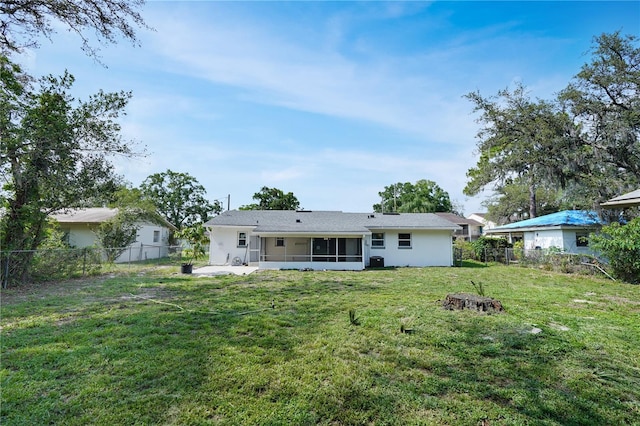 818 Ballard St, Altamonte Springs, FL 32701 - back of property with a sunroom, a patio area, and stucco siding