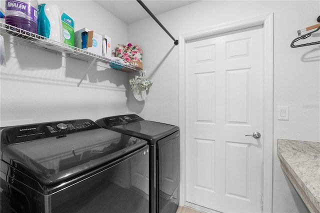 1524 Fleur Dr, Davenport, FL 33837 - washroom featuring separate washer and dryer