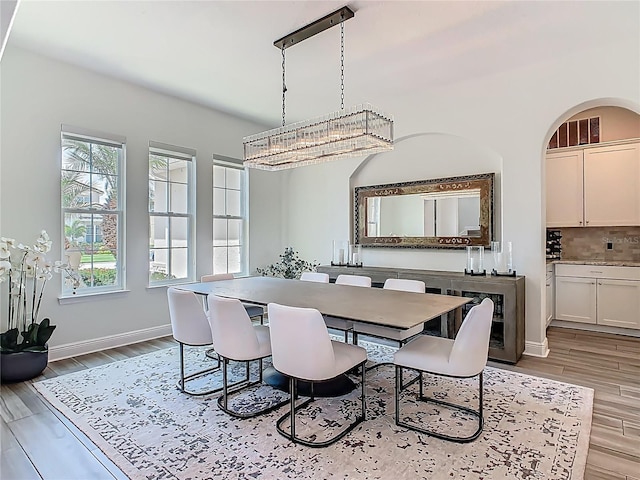 1211 Terralago Way, Kissimmee, FL 34746 - dining room with wood finished floors and baseboards