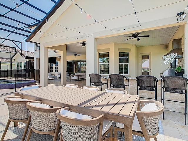 1211 Terralago Way, Kissimmee, FL 34746 - view of patio with ceiling fan, outdoor dining space, an outdoor pool, glass enclosure, and outdoor lounge area