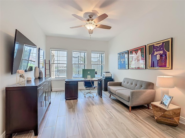 1211 Terralago Way, Kissimmee, FL 34746 - office area with ceiling fan, wood tiled floors, and baseboards