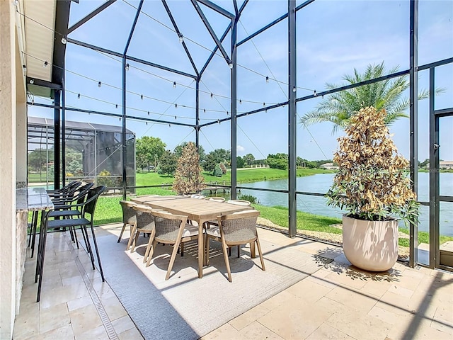 1211 Terralago Way, Kissimmee, FL 34746 - sunroom featuring outdoor dining space and a water view