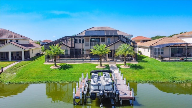 1211 Terralago Way, Kissimmee, FL 34746 - dock area with boat lift, a water view, a lawn, and a lanai