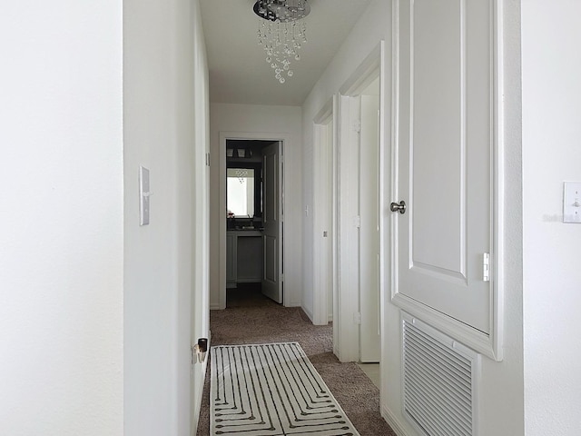 895 Overpool Ave, Davenport, FL 33896 - hall with carpet flooring and baseboards