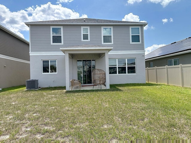 895 Overpool Ave, Davenport, FL 33896 - rear view of property featuring central AC, a patio area, and stucco siding