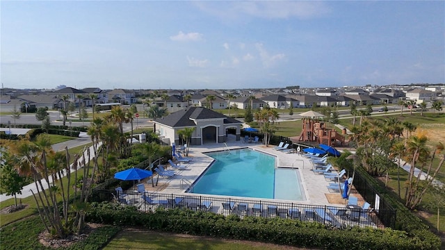 895 Overpool Ave, Davenport, FL 33896 - community pool featuring a residential view and a patio
