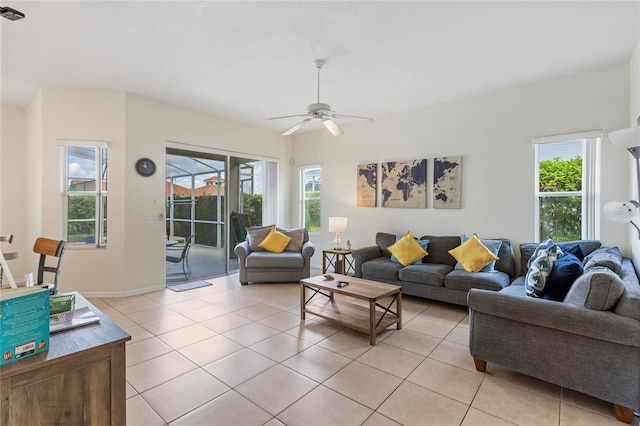 833 Brunello Dr, Davenport, FL 33897 - living room featuring plenty of natural light, light tile patterned floors, and ceiling fan