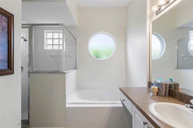 833 Brunello Dr, Davenport, FL 33897 - full bathroom with a shower stall, vanity, and a bath