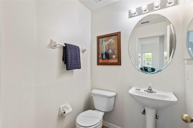 833 Brunello Dr, Davenport, FL 33897 - bathroom with toilet and baseboards