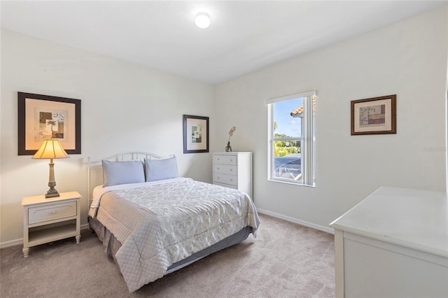 833 Brunello Dr, Davenport, FL 33897 - bedroom featuring carpet floors and baseboards