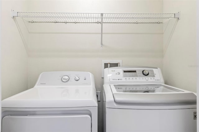 833 Brunello Dr, Davenport, FL 33897 - laundry area featuring separate washer and dryer
