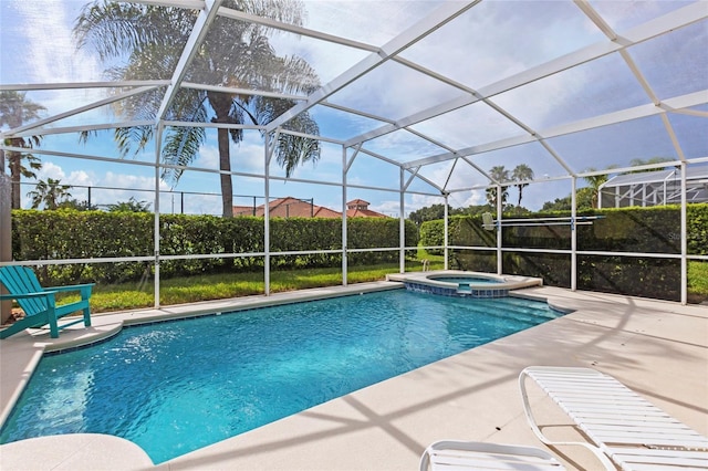 833 Brunello Dr, Davenport, FL 33897 - view of swimming pool with a patio, a pool with connected hot tub, and glass enclosure