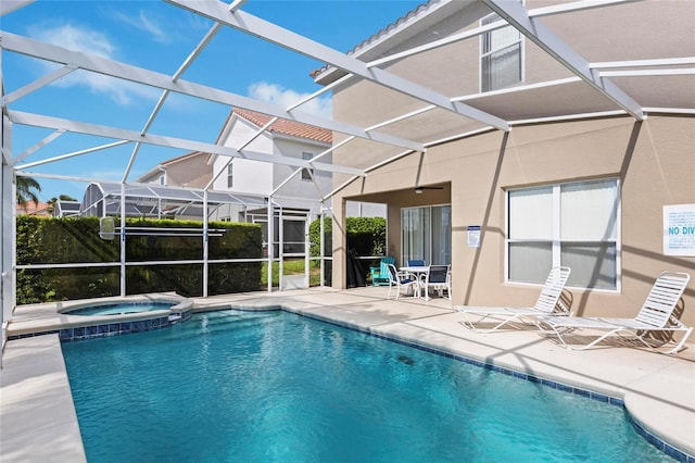833 Brunello Dr, Davenport, FL 33897 - view of pool with a patio area, a pool with connected hot tub, and a lanai