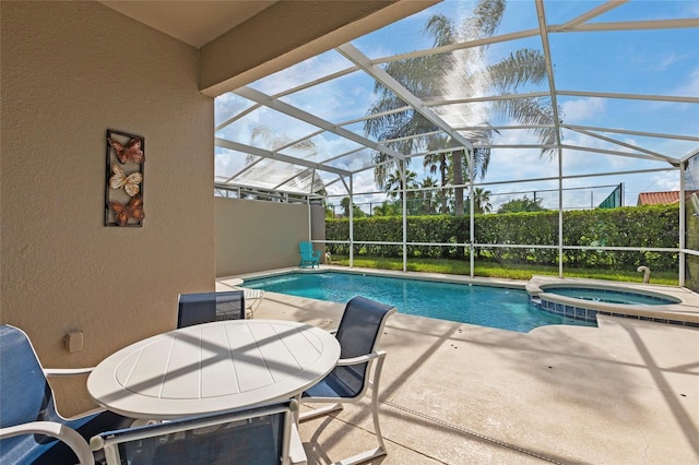 833 Brunello Dr, Davenport, FL 33897 - view of swimming pool with a patio area, a pool with connected hot tub, and glass enclosure