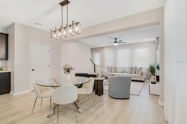 8042 Glenlloyd Ave, Winter Garden, FL 34787 - dining room featuring light wood-style flooring, baseboards, a ceiling fan, and recessed lighting