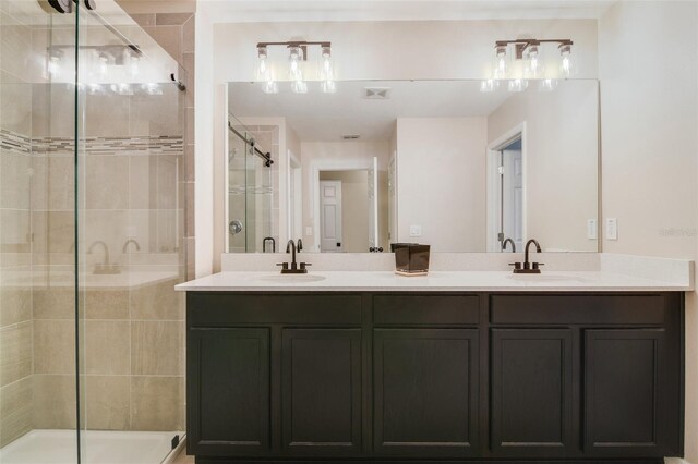 8042 Glenlloyd Ave, Winter Garden, FL 34787 - bathroom with a shower stall and double vanity