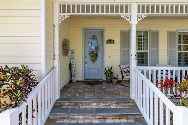 3349 Schoolhouse Rd, Harmony, FL 34773 - view of exterior entry with covered porch