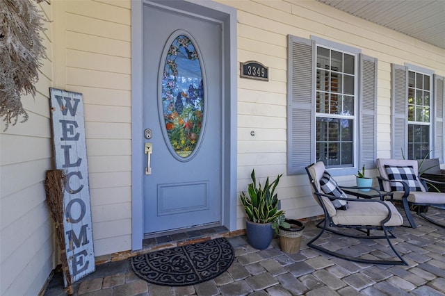 3349 Schoolhouse Rd, Harmony, FL 34773 - property entrance with a porch