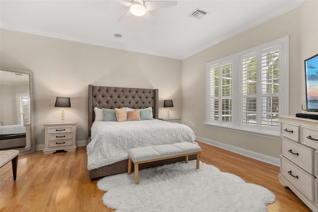 3349 Schoolhouse Rd, Harmony, FL 34773 - bedroom featuring ornamental molding, light wood finished floors, baseboards, and ceiling fan