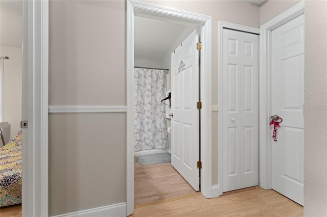 2507 Talega Dr, Saint Cloud, FL 34772 - bathroom with wood finished floors and baseboards