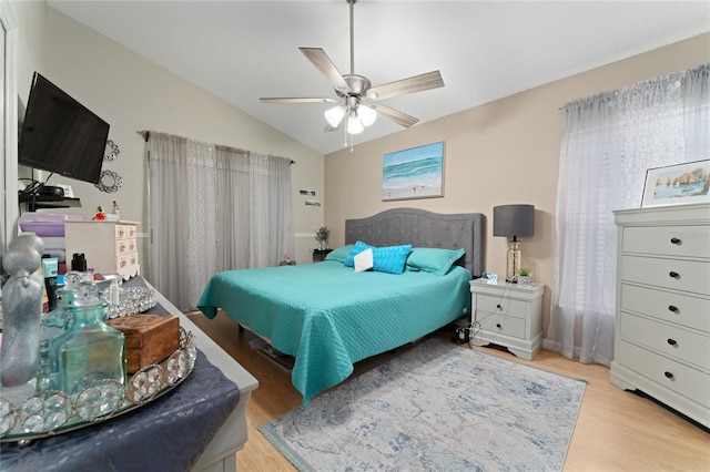 2507 Talega Dr, Saint Cloud, FL 34772 - bedroom featuring wood finished floors, lofted ceiling, and ceiling fan