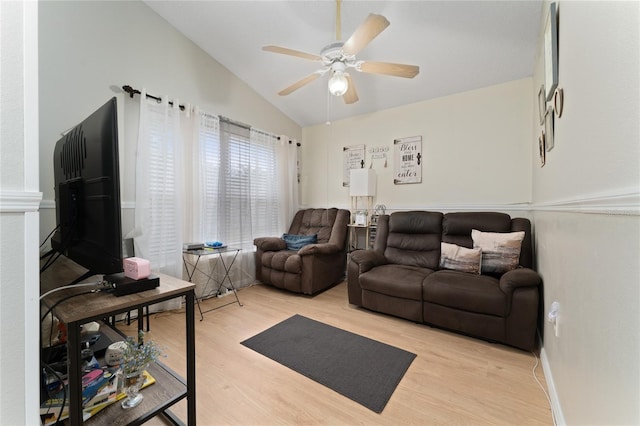 2507 Talega Dr, Saint Cloud, FL 34772 - living room featuring light wood-type flooring, lofted ceiling, ceiling fan, and baseboards