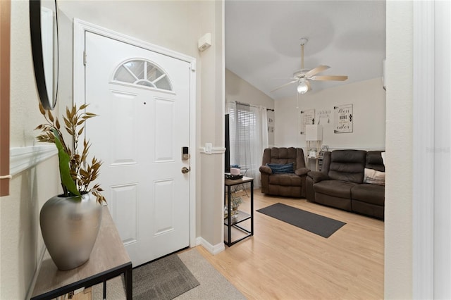 2507 Talega Dr, Saint Cloud, FL 34772 - foyer with light wood finished floors, a ceiling fan, and lofted ceiling