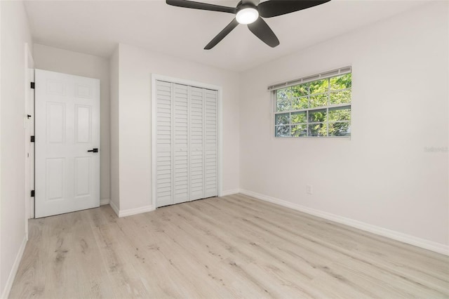 1842 Puritan Ave, Winter Park, FL 32792 - unfurnished bedroom with wood finished floors, baseboards, a closet, and a ceiling fan
