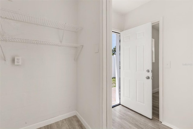 1842 Puritan Ave, Winter Park, FL 32792 - washroom featuring light wood-style floors and baseboards