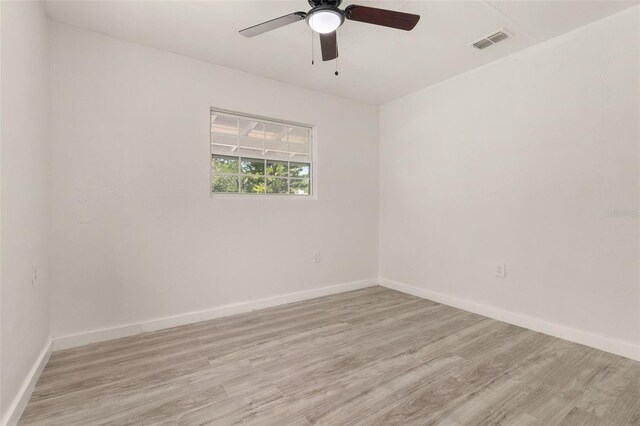 1842 Puritan Ave, Winter Park, FL 32792 - empty room featuring light wood-style flooring, ceiling fan, and baseboards