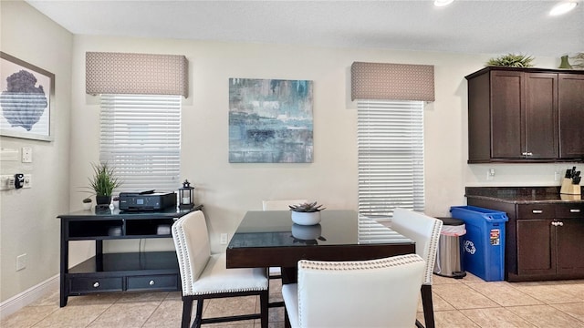 1228 Castle Pines Ct, Reunion, FL 34747 - dining area with light tile patterned flooring, baseboards, and recessed lighting