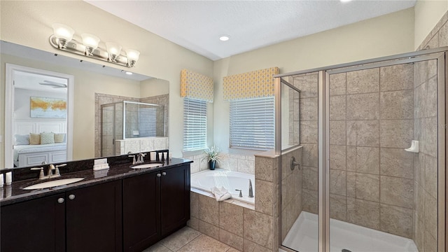 1228 Castle Pines Ct, Reunion, FL 34747 - full bath with a garden tub, a stall shower, tile patterned floors, and double vanity