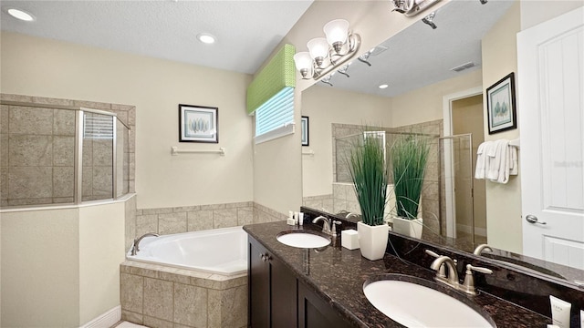 1228 Castle Pines Ct, Reunion, FL 34747 - bathroom with a stall shower, a bath, double vanity, and recessed lighting