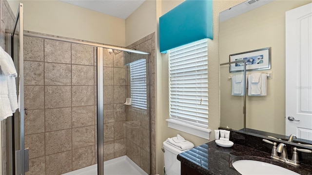 1228 Castle Pines Ct, Reunion, FL 34747 - bathroom with a stall shower, toilet, and vanity