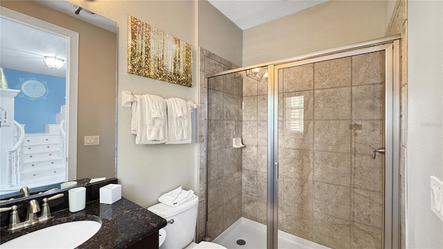 1228 Castle Pines Ct, Reunion, FL 34747 - bathroom with a stall shower, toilet, and vanity