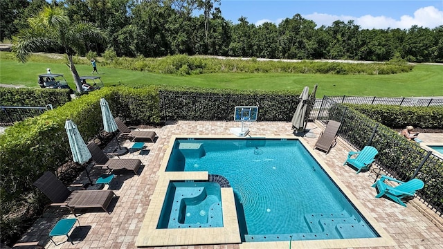 1228 Castle Pines Ct, Reunion, FL 34747 - view of swimming pool with a patio area, a pool with connected hot tub, and golf course view