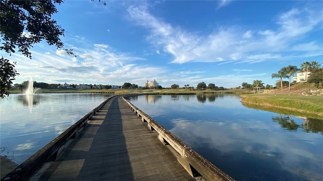 1228 Castle Pines Ct, Reunion, FL 34747 - dock featuring a water view