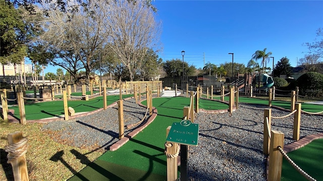 1228 Castle Pines Ct, Reunion, FL 34747 - view of play area featuring a putting area