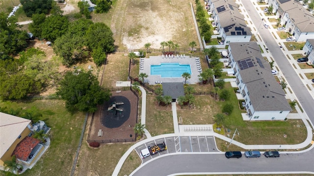 1113 Merrill St, Davenport, FL 33837 - aerial view of property and surrounding area with a pool and nearby suburban area