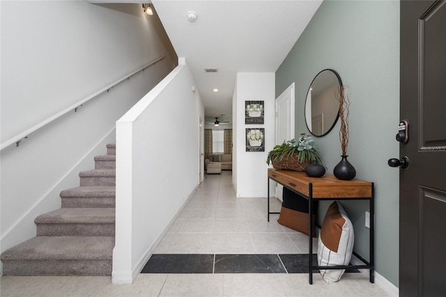 1113 Merrill St, Davenport, FL 33837 - corridor with stairway, tile patterned flooring, recessed lighting, and baseboards
