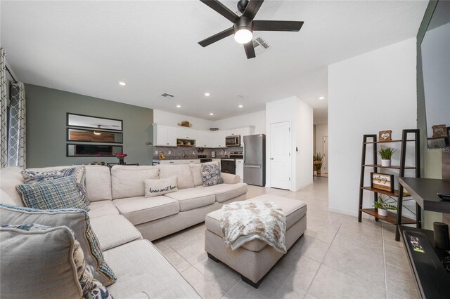 1113 Merrill St, Davenport, FL 33837 - living room featuring ceiling fan, recessed lighting, and light tile patterned flooring