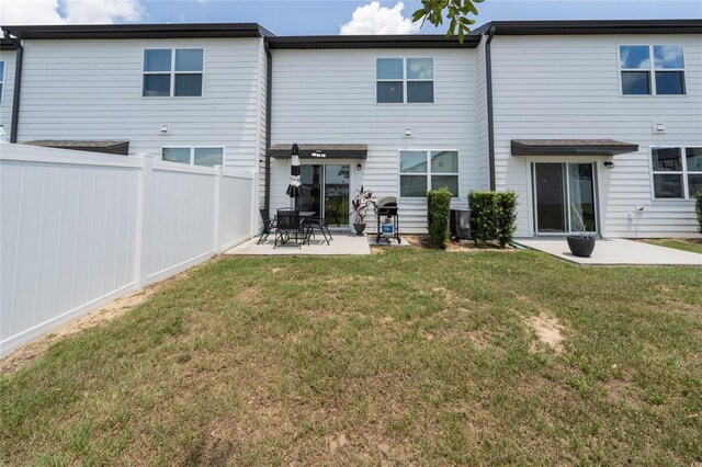 1113 Merrill St, Davenport, FL 33837 - rear view of house featuring a patio area